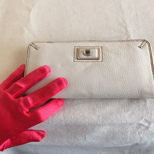 Calvin Klein white leather zip around wallet. Clean. Classy.